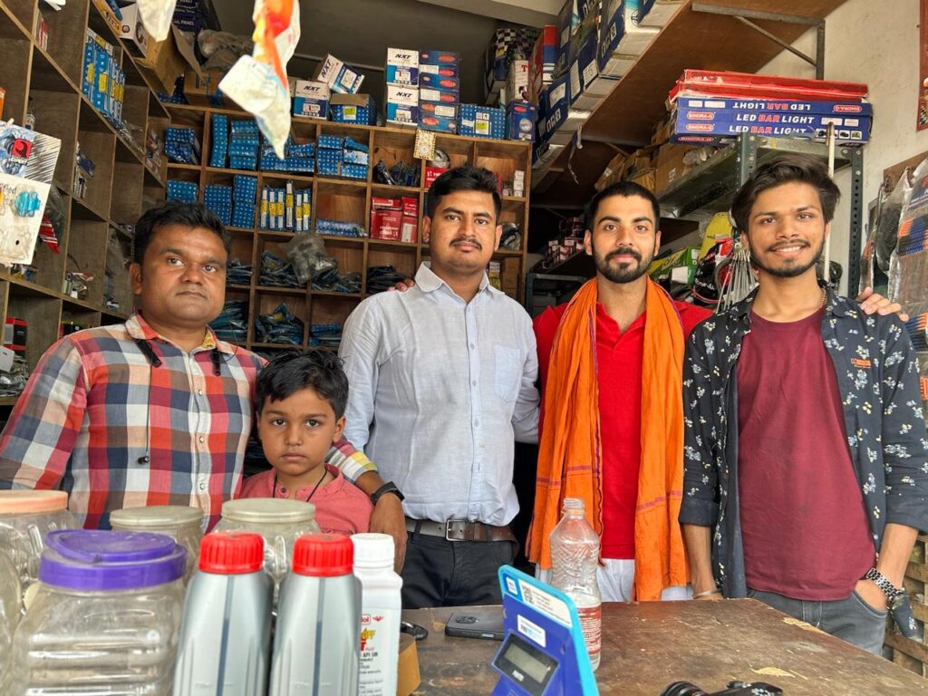 Adarsh and Naveen with shop owner Himanshu bhardwaj